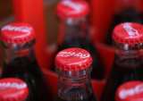 As Sales Soar, Coca-Cola Warns Against Over-Optimism