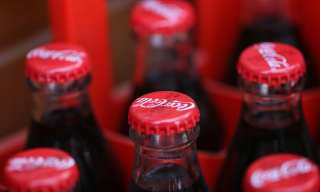 As Sales Soar, Coca-Cola Warns Against Over-Optimism