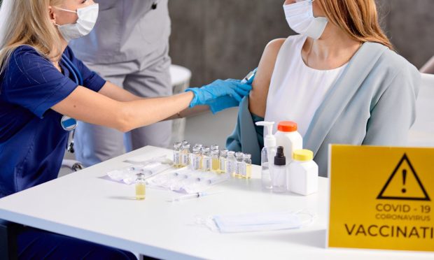 Carrot vs. Stick: Employers Look For Sweet Spot Between Vaccine Mandates And Incentives