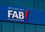 First Abu Dhabi to Sell Stake in $1B Payments Unit