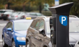 Scammers Using Fake QR Codes on Parking Meters to Divert Payments