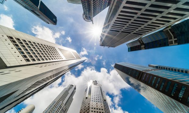 Singapore FinTech M-DAQ Buys Wallex in Prep for IPO