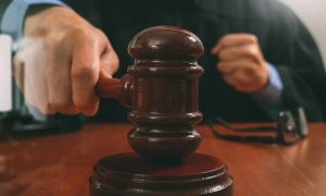 Men Charged in Separate Money Laundering Crimes