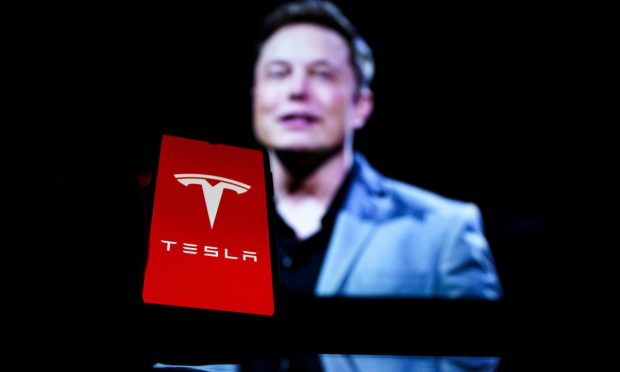 Tesla Shares Plunge 11% Following Twitter Deal