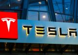 CE 100 Index Slips 2.3% as Tesla Shares Continue Skid
