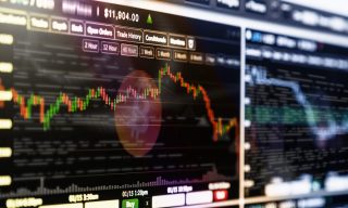 Rising Interest Rates Slow Down Bitcoin Trading Volume