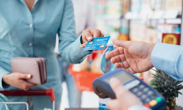 consumer paying with card