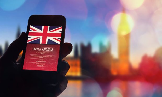 UK on smartphone, London backdrop
