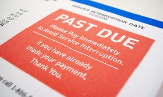 AT&T Dials Up Latest Sign of Distress for Paycheck-to-Paycheck Economy