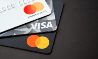 UK Parliament Asks Visa, Mastercard to Explain Swipe Fees Hike