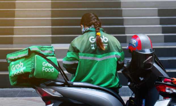 As Delivery Demand Falls, Grab Looks to Cut Costs