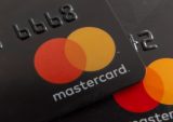 Mastercard Says Q4 Spending Lifted by Travel Rebound but Slowdown Looms