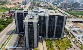 Nigeria Cuts ATM Cash Withdrawals and Urges eNaira Use