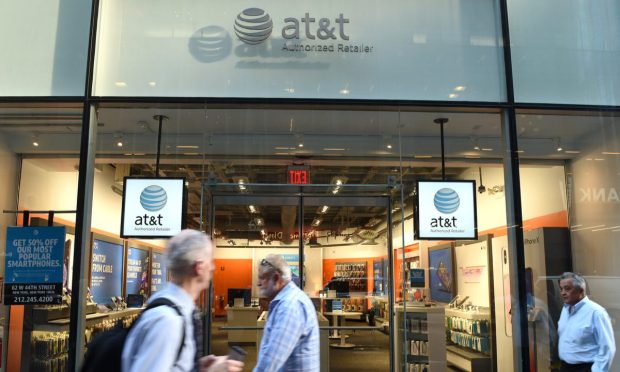 Consumers, Businesses Trim Spending on Phones as Economy Slows