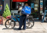 Food Delivery Companies Challenge New York City Minimum Wage Law