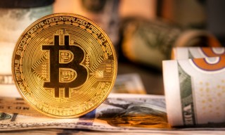 Bitcoin Surges to 17-Month High Before Retreating