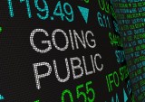 Going public stock market sign
