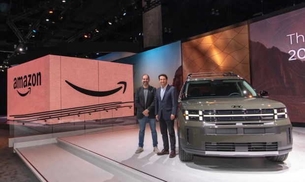 Amazon Drives Online Car Sales; Walmart Revs up Package Delivery