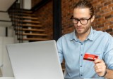 man checling out on eCommerce site