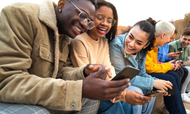 group of young people with phone