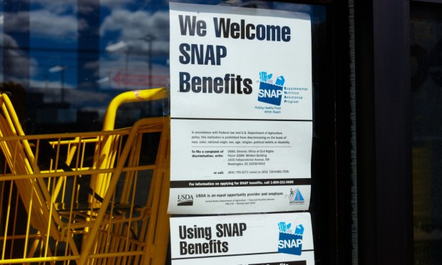 SNAP benefits welcome sign in store window