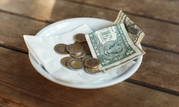 cash tip on plate
