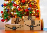 Amazon boxes beneath Christmas tree