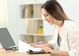 woman working on household budget
