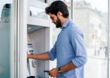 American Express Taps NCR Atleos for Surcharge-Free ATM Access