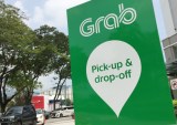 Grab rideshare pickup and drop-off sign