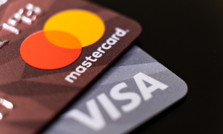 Mastercard, Visa Reach Settlement With Merchants in Swipe Fee Lawsuit