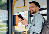 man using mobile wallet for transportation fare