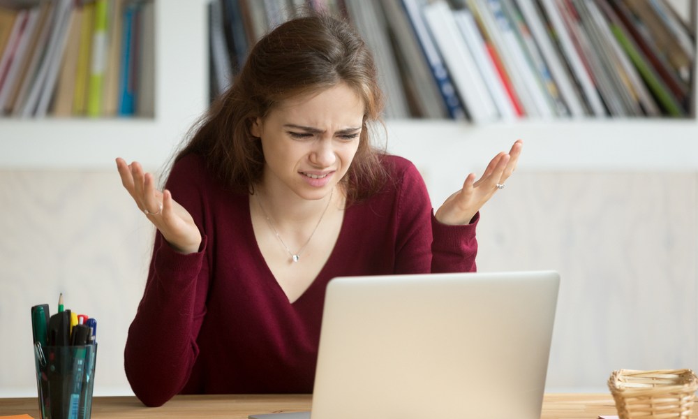 woman frustrated with online site