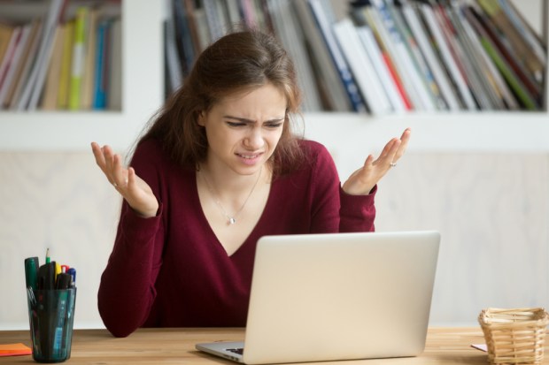 woman frustrated with online site