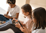 Gen Alpha kids with digital devices