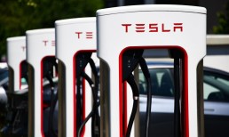 Tesla Calls Itself an AI, Robotics Company as Profits Plunge 55% 
