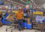 Amazon and Walmart Rethink Self-Checkout to Manage Costs