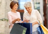 two women with shopping bags