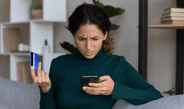 woman frustrated with credit card