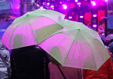 umbrellas at outdoor concert