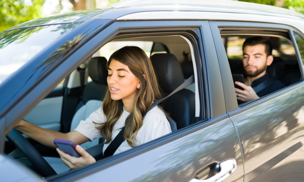 rideshare car, driver and passenger