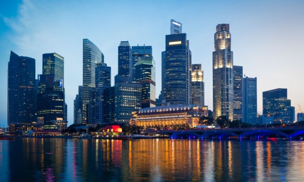 Singapore Considers Caning as Scams Jump 70%