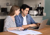 couple looking at bills
