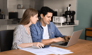 couple looking at bills