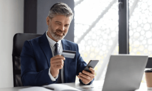 businessman with credit card and laptop