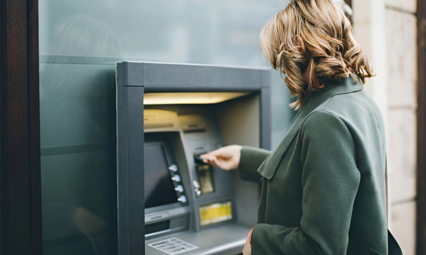 ATMs Outlast Predictions of Doom as Millennials Keep Cashing Out