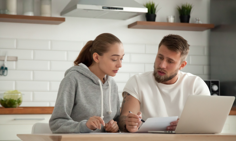 couple looking at bills