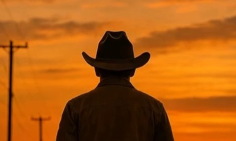 sunset silhouette person with cowboy hat