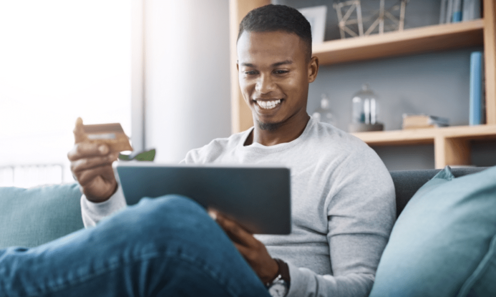 man online shopping with credit card