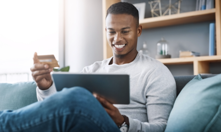 man online shopping with credit card